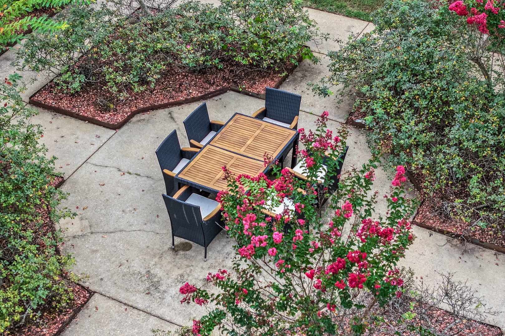 Outdoor Patio With Garden Views at Senior Living Facility